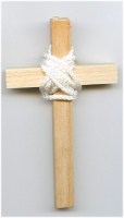 Croix de communion ave cordon.