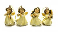 Lot de 4 anges musiciens. En résine, 5 cm.