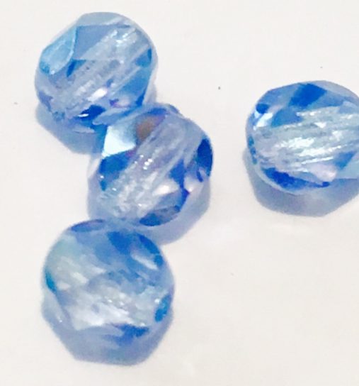 Perles demi-cristal ovales bleues 6 mm.130 perles