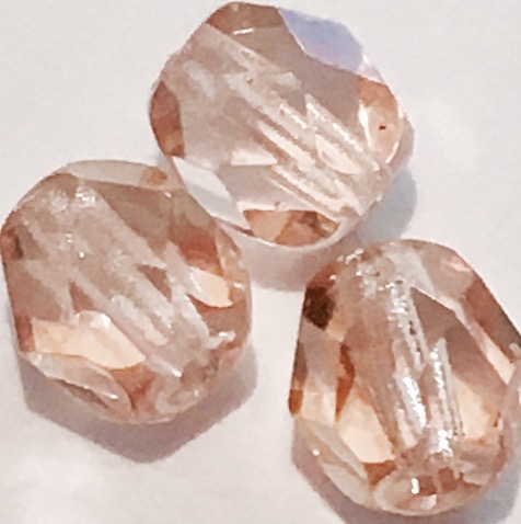 Perles demi-cristal ovales roses 6mm. 130 perles